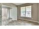 Versatile flex room with wood flooring and natural light, ready to customize to your needs at 12679 Chargers Ct, Fishers, IN 46037