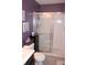Bathroom with a shower and glass door, a vanity, and decorative wall art at 12901 N Collett Way, Camby, IN 46113