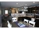 Spacious open-concept kitchen with stainless steel appliances offering a practical and inviting cooking space at 12901 N Collett Way, Camby, IN 46113