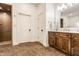 Bright bathroom showcases double sink vanity, granite countertop, and a walk in shower at 13346 W Sherbern Dr, Carmel, IN 46032