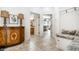 Bright entryway showcasing designer details and access to the kitchen and bath at 13346 W Sherbern Dr, Carmel, IN 46032