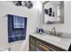Elegant bathroom featuring a marble countertop, gold hardware, and decorative accents at 13844 N Cardonia Dr, Camby, IN 46113