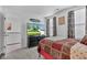 Comfortable bedroom showcasing a queen-sized bed, flat screen television, dresser, and soft natural light at 13844 N Cardonia Dr, Camby, IN 46113