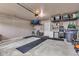 Clean and organized two car garage with ample storage and a clean floor at 13844 N Cardonia Dr, Camby, IN 46113