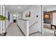 Hallway shows gray trim, and leads to various rooms, including a bedroom and bathroom at 13844 N Cardonia Dr, Camby, IN 46113