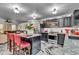 Open concept kitchen with stainless steel appliances, granite counters, and breakfast bar seating at 13844 N Cardonia Dr, Camby, IN 46113