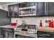 New range in modern kitchen featuring stainless steel appliances and granite counter tops at 13844 N Cardonia Dr, Camby, IN 46113