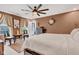Bedroom boasts natural light, contemporary decor, and a ceiling fan at 13844 N Cardonia Dr, Camby, IN 46113