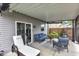 Inviting covered patio with stylish outdoor furniture creating a comfortable space for relaxation and entertaining at 13844 N Cardonia Dr, Camby, IN 46113