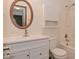 Updated bathroom with a modern vanity, cabinets, and shower/tub combo at 1411 Mimosa Ct, Greenfield, IN 46140