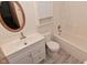 Bathroom features a modern vanity, storage cabinet, and shower/tub combo at 1411 Mimosa Ct, Greenfield, IN 46140