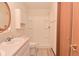 Bathroom featuring shower, toilet and sink with updated cabinets at 1411 Mimosa Ct, Greenfield, IN 46140