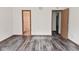Bedroom offers two doorways leading to separate areas of the house at 1411 Mimosa Ct, Greenfield, IN 46140