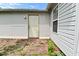 Exterior door on patio with siding, surrounded by brick pavers at 1411 Mimosa Ct, Greenfield, IN 46140