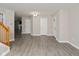 Bright, airy living room featuring neutral paint, hard surface floors, and multiple access doorways at 14446 Chapelwood Ln, Fishers, IN 46037