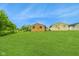 Spacious backyard with ample green space perfect for outdoor activities at 1513 S Rural St, Indianapolis, IN 46203