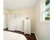 Bedroom with a closet, dresser and a window letting in natural light at 1513 S Rural St, Indianapolis, IN 46203