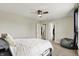 Bedroom with a large window, ceiling fan and an inviting bean bag chair at 1586 Mairn Ave, Carmel, IN 46032