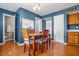 Bright dining room with a table and chairs, wood flooring, and natural light at 1605 Perry Commons Blvd, Indianapolis, IN 46217