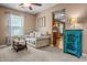 Cozy living room features a comfortable sofa and a view into the adjacent kitchen at 1605 Perry Commons Blvd, Indianapolis, IN 46217