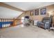 Cozy loft featuring a modern workstation, comfortable seating, and natural light perfect for work or relaxation at 1605 Perry Commons Blvd, Indianapolis, IN 46217