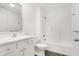Bathroom featuring a vanity, toilet, and shower/tub combo at 1612 Paula Dr, Columbus, IN 47201