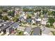 Vibrant aerial view of a neighborhood highlighting various home styles and tree-lined streets at 1717 Carrollton Ave, Indianapolis, IN 46202
