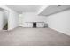 Spacious basement with a convenient wet bar and cabinetry for entertaining and relaxation at 1717 Carrollton Ave, Indianapolis, IN 46202