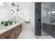 Modern bathroom with a double vanity, stylish shower, and sleek fixtures at 1717 Carrollton Ave, Indianapolis, IN 46202