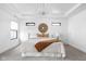Bright bedroom with neutral tones, ample natural light, and stylish decorative accents at 1717 Carrollton Ave, Indianapolis, IN 46202