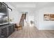 Inviting foyer with hardwood floors, a staircase, and tasteful decor at 1717 Carrollton Ave, Indianapolis, IN 46202