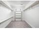 Spacious walk-in closet with shelving and ample storage space at 1717 Carrollton Ave, Indianapolis, IN 46202