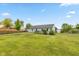 Spacious backyard featuring a lush lawn, patio, and privacy fence offers plenty of room for outdoor activities at 18005 Gasparilla Ct, Westfield, IN 46062