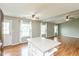 Bright kitchen with stainless appliances and center island opens to living room at 18005 Gasparilla Ct, Westfield, IN 46062