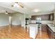 Open concept kitchen boasts an island, stainless appliances and ample counter space at 18005 Gasparilla Ct, Westfield, IN 46062