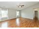 Spacious living room featuring hardwood floors, neutral paint, and natural light at 18005 Gasparilla Ct, Westfield, IN 46062