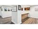 View of basement bar with wood-style vinyl flooring and view of the bar area at 18998 Beverly Shones Ln, Noblesville, IN 46062