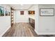 Finished basement featuring sliding barn door and custom cabinets with granite counters at 18998 Beverly Shones Ln, Noblesville, IN 46062