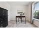 Bedroom features neutral tones, carpet floors, a desk and chair set, plus a black cabinet with drawers for storage at 18998 Beverly Shones Ln, Noblesville, IN 46062