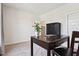 Bedroom featuring a neutral color palette, carpet flooring, a desk with a chair, and an open door at 18998 Beverly Shones Ln, Noblesville, IN 46062