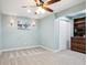 Bedroom with light blue walls, a ceiling fan and a closet at 18998 Beverly Shones Ln, Noblesville, IN 46062