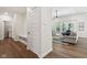 Bright living room featuring modern furniture, hardwood floors, and a large window at 18998 Beverly Shones Ln, Noblesville, IN 46062