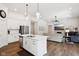 Open-concept living space showcases the kitchen, living room, and seamless design at 18998 Beverly Shones Ln, Noblesville, IN 46062