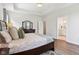 The bright main bedroom offers hardwood floors and an ensuite bathroom at 18998 Beverly Shones Ln, Noblesville, IN 46062