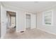 Bedroom featuring an closet, doorway, neutral carpet and natural light at 1938 N Dearborn St, Indianapolis, IN 46218