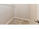 Walk-in closet with carpet and wire shelving, ready for organization at 2026 Spruce St, Indianapolis, IN 46203