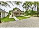 Attractive single-story home featuring a covered porch and small well-maintained yard, creating a welcoming curb appeal at 2026 Spruce St, Indianapolis, IN 46203