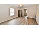 Kitchen with stainless steel refrigerator and wood-look flooring at 2026 Spruce St, Indianapolis, IN 46203