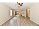 Spacious living room with hardwood floors and a ceiling fan, creating a welcoming and comfortable living area at 2026 Spruce St, Indianapolis, IN 46203