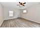 Inviting living room featuring hardwood floors, a ceiling fan, and neutral paint, creating a cozy and welcoming atmosphere at 2026 Spruce St, Indianapolis, IN 46203